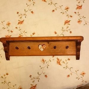 A solid wood. Little shelf.